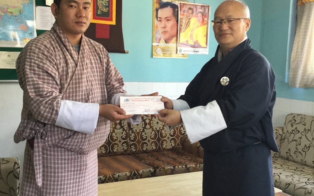 Dr. Chencho Dorjee, Medical officer, Gidakom Hospital, Thimphu receiving the Research Grant from the Hon’ble President, KGUMSB