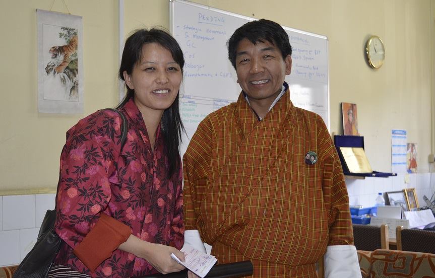 Ms. Jigme Choden, Chief Nurse, JDWNRH, Thimphu Receiving the Research Grant from the Director, KGUMSB